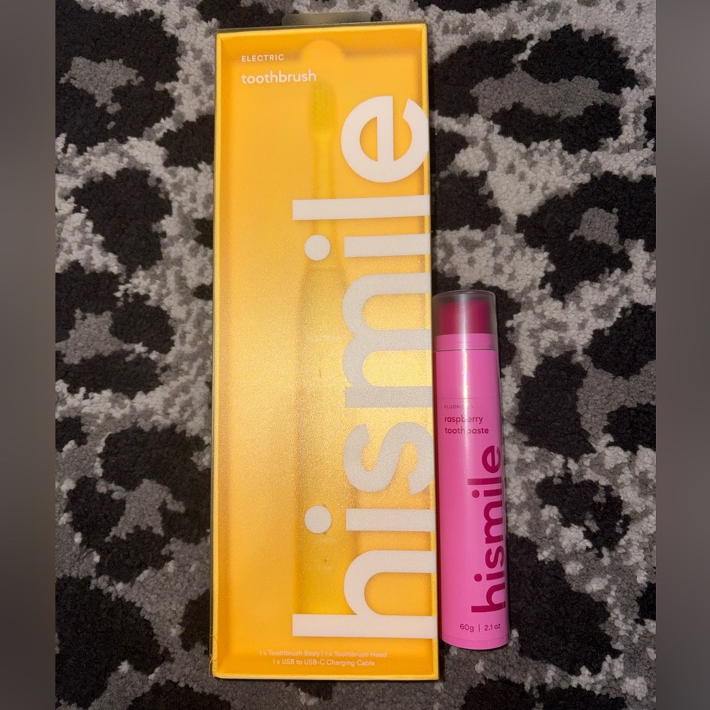 hismile yellow electric toothbrush and toothpaste.